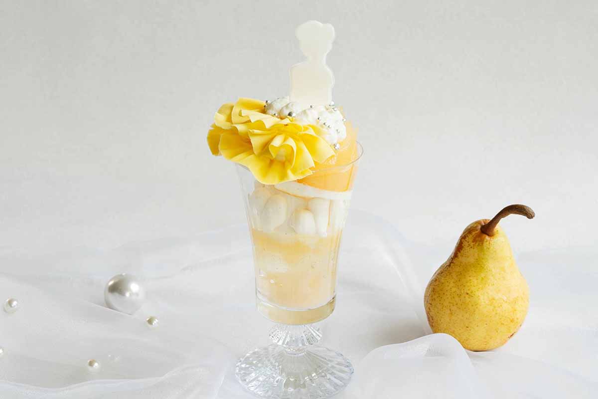 アラザンの煌めく装飾とチョコレートのドレープでドレスを着ているようなプリンセス