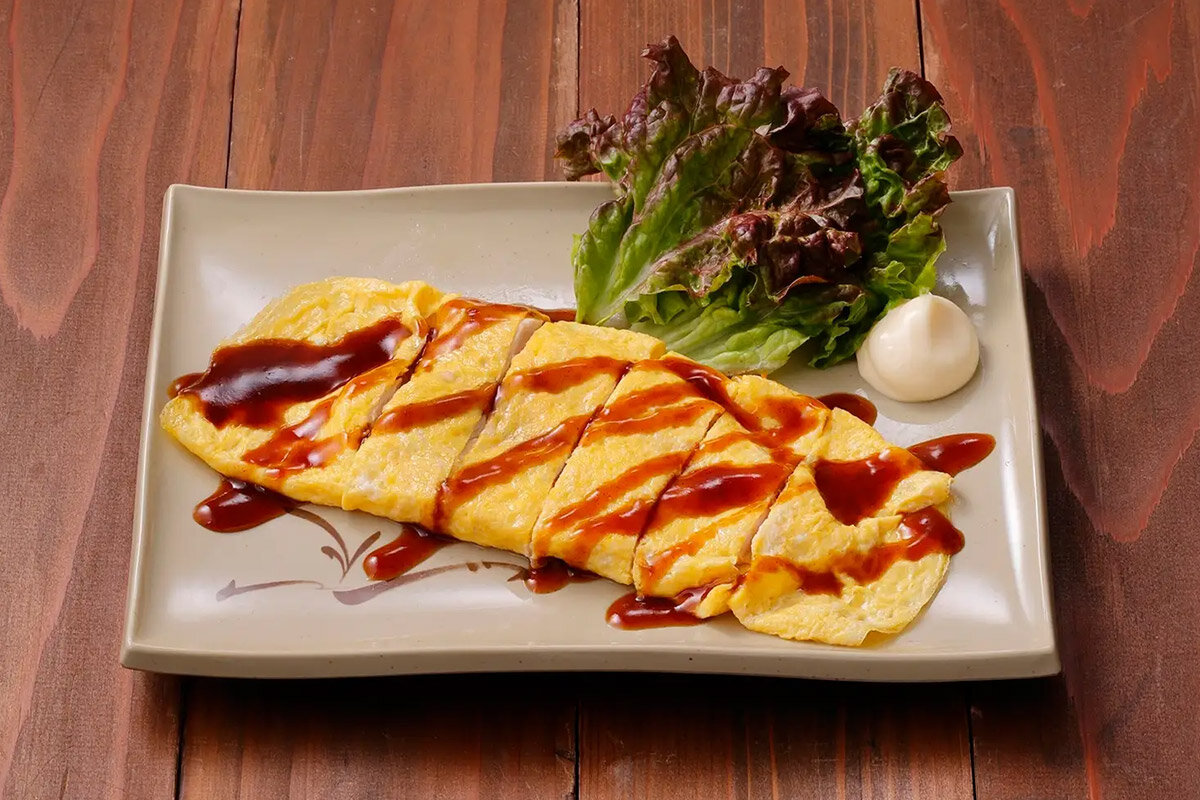 グループの大倉代表が考案した創作料理で、当時の人気メニュー「鳥平焼」